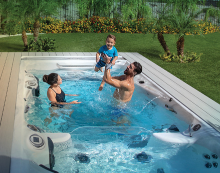 Phelps and family in a swim spa.