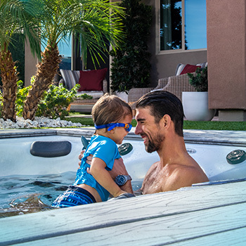 Phelps holding son Boomer.