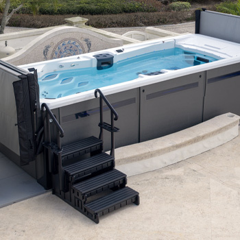 Steps leading up to a swim spa.